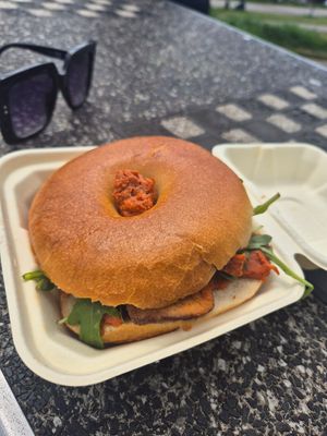 Sun dried tomato pesto, smoked tofu and aragula bagel at Massolit Bakery & Cafe in Krakow