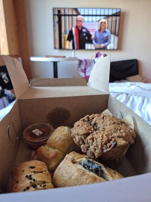 Garlic knot, coffee cake, dill in a blanket, sausage roll at Bad Attitude Bread in Toronto