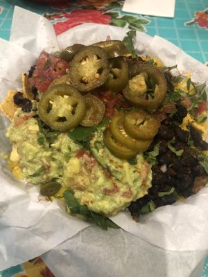 Vegan Nachos - jalapeños, refried beans, cheese  at La Choza in Brighton