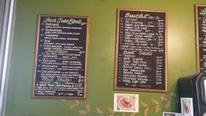 wall menus at Giri Kana Cafe in Southport
