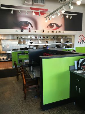Kitchen and part of the dining area at Masu Sushi & Noodles in Apple Valley