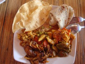 various dishes and chapati at Sharaswhaty in Ubud