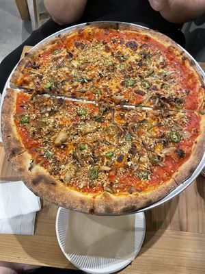Tomato pizza with mushroom and jalapeño, half vegan.   at Hughes Pizza ヒューズ ピザ in Osaka