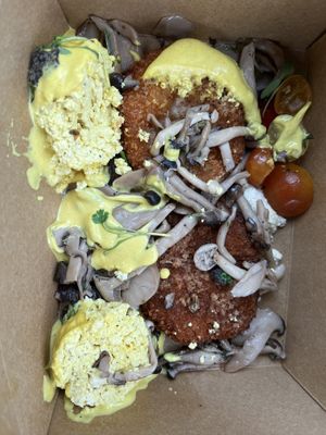 The eggs Benny take away meal got tossed around (“eggs” feel off to the side) but YUM!   at Heirloom in Vancouver