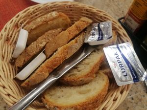 Complimentary bread did not come with vegan-friendly spread at Bistro 516 in Valletta