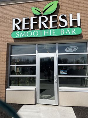 Outside next to LA fitness   at Refresh Cafe & Smoothie Bar in Fairport