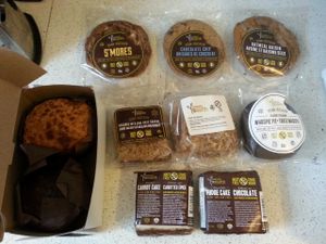 Veggielicious 2016 special! 10 nut-free desserts for $20. Sour cream coffee cake muffin, chocolate zucchini muffin, S'mores cookie, chocolate chip cookie, oatmeal raisin cookie, date square, apple pie square, whoopie pie, carrot cake, and chocolate fudge cake. at Sweets from the Earth in Toronto