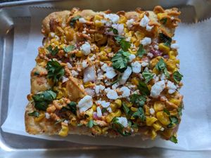 Elotes focaccia at Woodhouse Bakery + Coffee  Shop  in Columbus