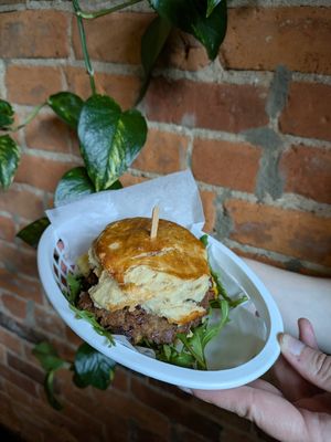 Sausage eggs and cheese biscuit at Woodhouse Bakery + Coffee  Shop  in Columbus