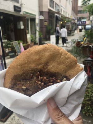 My gluten-free vegan hotteok cookie with cinnamon sugar and walnuts   at Moonggoojeom Vegan Bakery in Busan