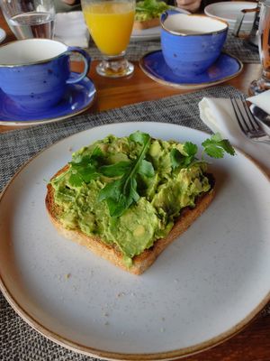 Avocado toast without eggs and cheese on probably not vegan bread....! at Celajes at Hotel Belmar in Monteverde