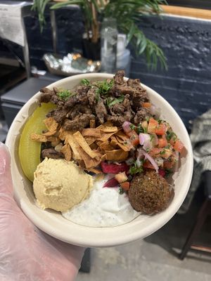 Build your own bowl with falafel and vegan chicken shawerma   at Koshary Corner in Baltimore