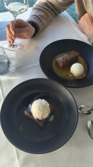 Vegan sticky date below, the non vegan sticky date above at Harbourfront Seafood Restaurant  in Wollongong