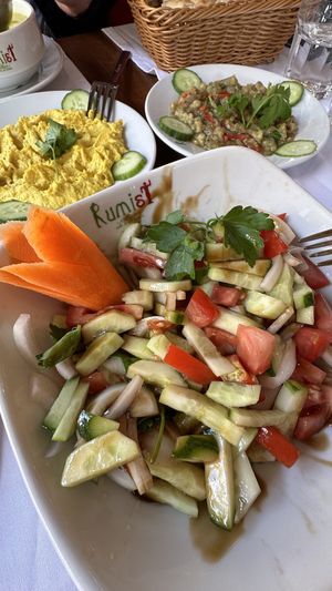 Hummus, eggplant paste and salad with cucumber, tomatoes and onion  at Rumist in Istanbul