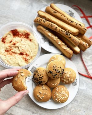 Vegan breads and grissini with sesame, sunflower seeds and oatmeal + homemade hummus with red pepper at Veg Mama Made in Yerevan