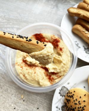 Vegan grissini with sesame, sunflower seeds and oatmeal +  homemade hummus with red pepper at Veg Mama Made in Yerevan