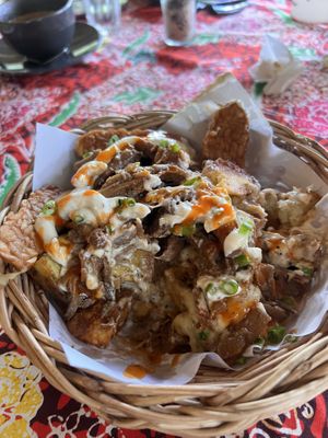 Super cheesy basket with some chili sauce   at Earth Tone in Pai