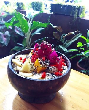 Yellow tropical smoothie bowl at Earth Tone in Pai