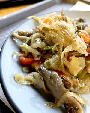 Fried oyster mushrooms with peppers. However, this dish contains a bunch of the huge pieces of half-raw onions and a lot of vegetable oil. There are few oyster mushrooms, and even fewer peppers. I didn't finish it :( at Art Lunch - Nalbandyan St in Yerevan