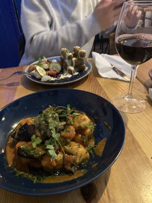 Gnocchi with eggplant and falafel in the back at The Food Temple in Lisbon