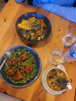 Polenta ragu, tempeh salad, and pumpkin soup at The Food Temple in Lisbon