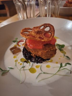 Crisp & Spice - Cripsy smoked tofu cake with aloe vera , braised black rice , spicy lotus root , coconut & lemongrass sauce at The Food Temple in Lisbon