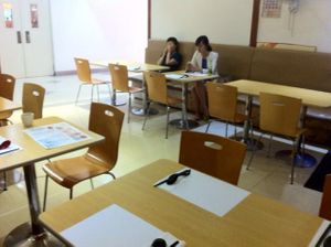 Inside - The woman in green talking on her phone was one of the two front if house staff when I visited. She seemed more concerned with speaking on the phone than doing her job if I'm honest. at Taiwan Brother 7 Vegan Hut - Lu Wan in Shanghai