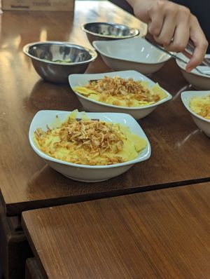 Tumeric sticky rice with mung bean at Onetrip with Local in Hanoi