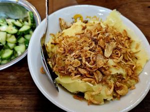 Sticky rice with turmeric and mung beans at Onetrip with Local in Hanoi