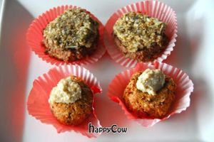 delicious carrot cupcakes with coconut cashew frosting and vanilla spice macaroons with cacao cream filling. at Raw on Rye in Rye