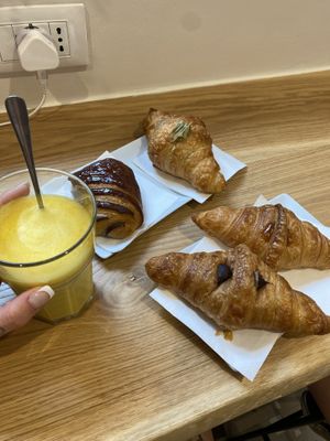 Golden milk, pain au chocolat, 3 croissants   at Nepá in Milan