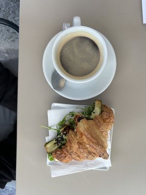 Savory croissant and americano   at Nepá in Milan
