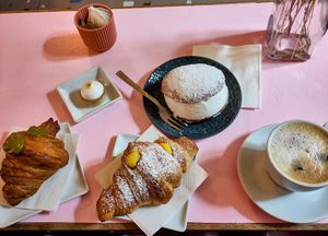 Croissant pistacchio, croissant crème,maritozzo alla panna,small dessert lemon cream and meringue at Nepá in Milan
