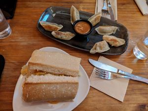 gyozas and bread with tortilla at Viva Chapata in Madrid