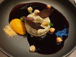 Marzipane mousse with elderberry sauce and sea buckthorn sorbet at The Newport Restaurant & Marina in Luebeck