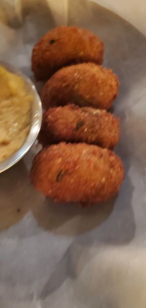 Garbanzo Kefte (a few missing 😏) & hummus at Nisi Greek Taverna in Schererville