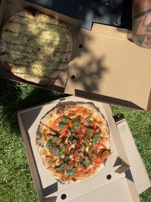 Cheesy garlic sticks (actually like a smaller pizza) and seitan pesto pizza   at Pizza Attack in Coyhaique