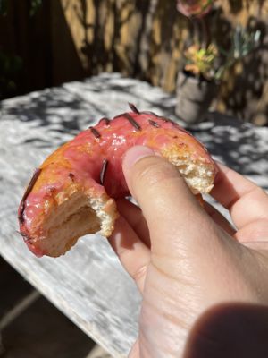 Donut with pomegranate chocolate glaze  at Hook and Press in Santa Barbara