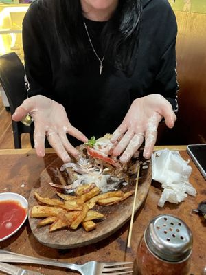 Went through so many napkins trying to eat the sandwich 🫠  at Catapilcana Vegana in Santiago