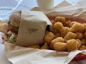 Chicken sammie with tots   at Nice Burger in Mission Viejo