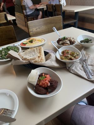 Falafel, tabouli, hummus, loubie, spicy cauliflower, diwali, and pita    at Aladdin's Eatery in Boardman