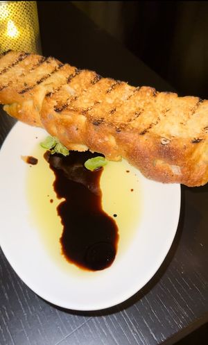 Seasoned Bread with oil and balsamic (devoured in seconds😆)  at Positano - JW Marriott Marquis Hotel in Dubai