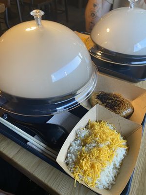 Super fun presentation! We ordered rice to add to the broth after the noodles were gone.  at REDWHITE BONELESS RAMEN - Studio City in Studio City