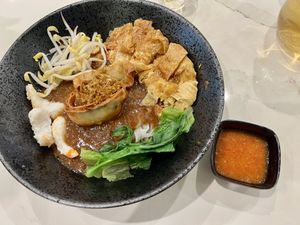 Noodle dish with mock meat/tofu and mock seafood   at SIN - Greendot Plus - Jewel in East Singapore