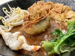 Noodle dish with mock meat/seafood   at SIN - Greendot Plus - Jewel in East Singapore