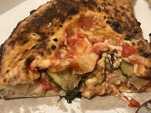 🍆🍕NEAPOLITAN CALZONE STUFFED WITH VEGAN MOZZARELLA, DEEP-FRIED AUBERGINES, SAUTÉED MUSHROOMS AND DEEP-FRIED COURGETTES 🍄🥒  at Sacro Dough Pizza in North West London
