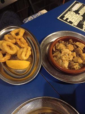 Calamares y pollo al ajillo at B13 Bar in Madrid