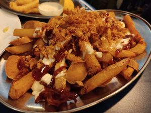 Salchipapas at B13 Bar in Madrid