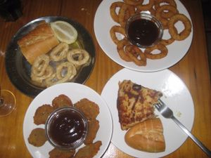 Calamares, onion rings, tortilla, St Jacobs at B13 Bar in Madrid