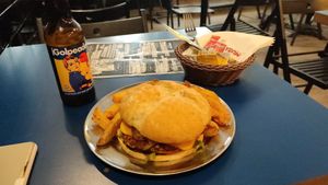 B13 Burger and Golpeadora beer at B13 Bar in Madrid
